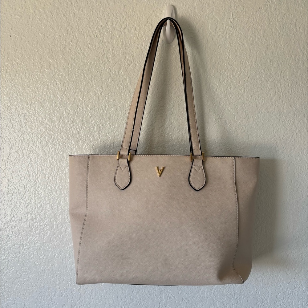 Cream bag with black polka dot lining inside #038